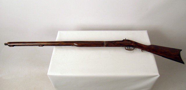Pirates Of The Caribbean Black Pearl Stunt Musket Prop: Used as a background action prop in "Pirates of the Caribbean : Curse of the Black Pearl" (2003). This musket is made of faux-wood. Having been used as a "stunt rifle", it has seen some major action a