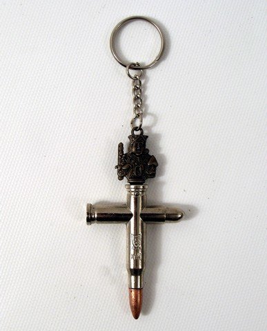Team America Bullet Crucifix Keychain Prop: Only the genius of Trey Parker and Matt Stone could have created "Team America: World Police" (2004), as a homage to the all marionette British sci-fi TV series "Thunderbirds". So it's no wonder that