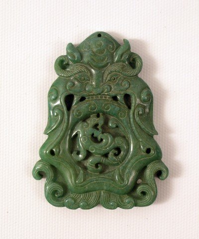 Kill Bill Vol 1 Asian Carved Decoration Prop: A jude-colored metal Asian inspired "carved" wall decoration from "Kill Bill: Vol 1" (2003). (Approx. 3" long).