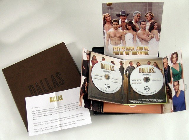 Dallas (TNT) Limited Edition DVD Promotional Box: From the return of the smash hit "Dallas" which is now on TNT, and included many of the original cast including Larry Hagman and Patrick Duffy, this is a limited edition promotion DVD Collectors box o
