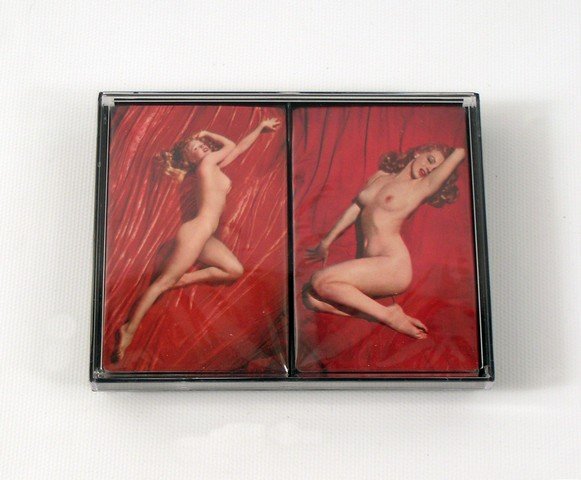 Marilyn Monroe 1976 Tom Kelly Playing Cards: Authorized by famous photographer Tom Kelly himself in 1976, these are a sealed set of playing cards featuring the famous Marilyn Monroe "Golden Dreams" and "A New Wrinkle" poses that Kelly originally