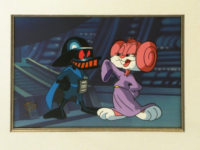 Tiny Toons A Quak In The Quarks Production Cel: Genuine production art cel from Tiny Toon Adventures "A Quak in the Quarks". Pictures Pluck as Darth Vader and Babs as Princess Leia. Also has original hand drawing of the cel frame. Comes mounted and