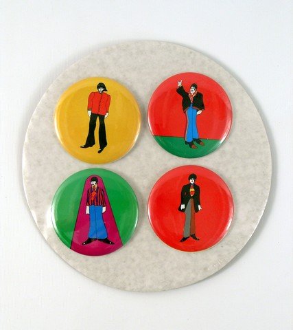Beatles Yellow Submarine Original Set Of Buttons: This is a Minty Mint authentic 1968 vintage original set of four pin-backed buttons that promoted the animated movie "The Beatles Yellow Submarine" (1968). The buttons depict the movie's animated rend