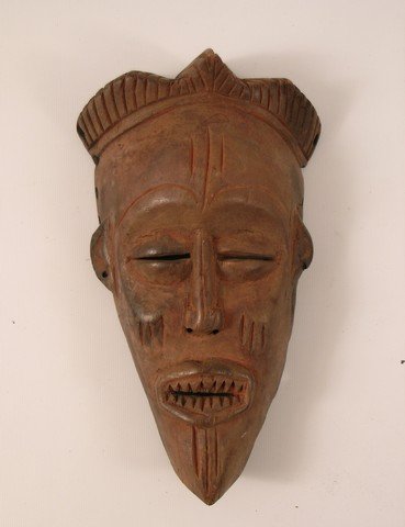 Pirates Of The Caribbean Dead Man's Chest Headhunter's: A realistic wood carved headhunters head mask from "Pirates of the Caribbean: Dead Man's Chest" (2006). (Approx. 10 1/2" long).