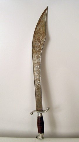 Kill Bill Vol 2 Broad Saber Prop: In "Kill Bill: Vol. 2" (2004), The Bride, Beatrix Kiddo, (Uma Thurman), continues to seek revenge against her ex-boss, Bill (David Carradine). This is a deadly metal Asian-machete style broad saber wi