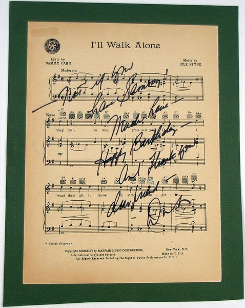 I'll Walk Alone Dinah Shore Signed Sheet Music: One of Dinah Shore's biggest hits was Sammy Cahn's "I'll Walk Alone" written in 1944 and expressing the forced separation between women and their men during World War II. Dinah first sang it in the cl