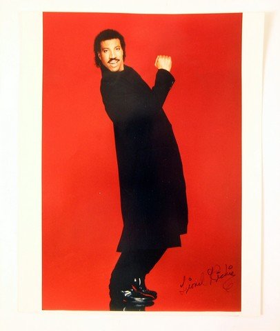 Lionel Richie Signed Photo: Lionel Richie autographed photo. This was signed directly for a Canadian store owner. (8"x10")