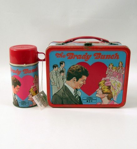 Brady Bunch 1970 Lunchbox and Thermos: This "Brady Bunch" metal lunch box was made by King Seeley Thermos Company in 1970. The box has a hinged lid with one silver metal snap and a collapsible red, plastic handle. The box features animated