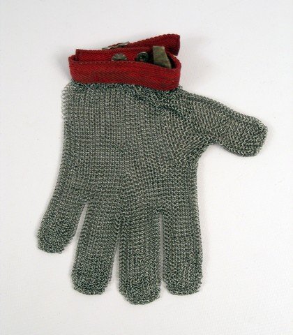 Saw III Chainmail Glove Prop: Jigsaw (Tobin Bell), shows his own version of a medical plan in "Saw III" (2006). This is a chainmail glove prop used in the production.
