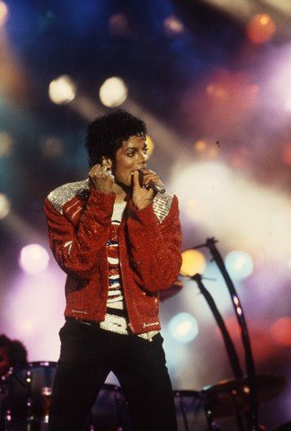 Michael Jackson Concert Photo & Copyright From Solo: The almost blinding beauty of the young Michael Jackson marching to the tune while on solo tour circa 1979. These photos were commission by Joe Jackson, father, founder and early manager of his childr
