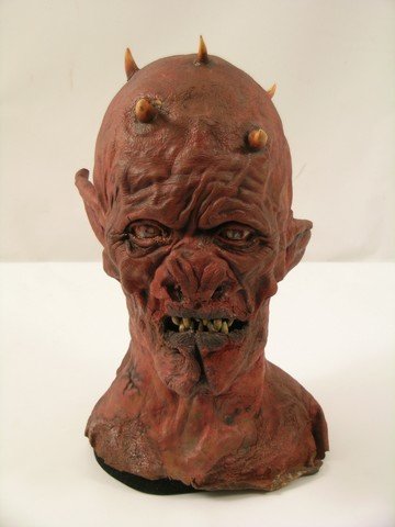 Buffy The Vampire Slayer Zombie Devil-Zombie Head: From the long running cult TV Series "Buffy the Vampire Slayer", this is a wonderfully terrifying "devil-zombie" head, complete with skull horns, needle teeth, devil ears and nose and bloody eyes. Ext