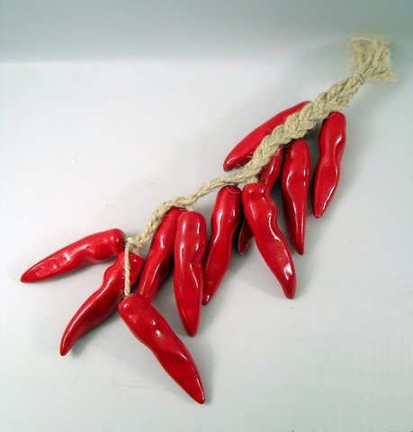 Friends Chili Pepper Prop: For ten years the country had a group of "Friends" that they could not live without (1994-2004). This is a decorative string of plastic chili peppers used as a background prop in the production. (Appr
