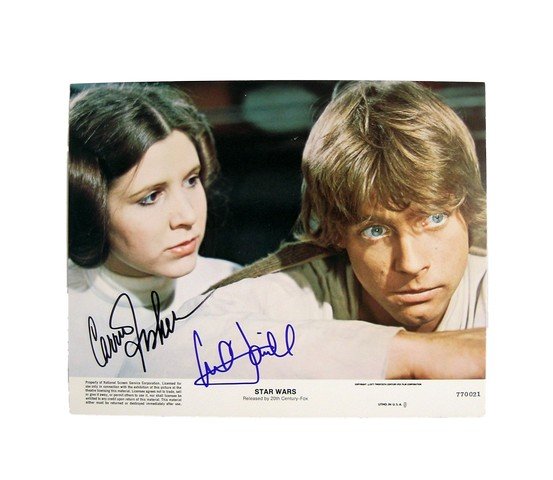 Star Wars Mark Hamill/Carrie Fisher Signed Lobby Card: Star Wars Mark Hamill/Carrie Fisher Signed Lobby Card - What with Disney's purchase of the "Star Wars" franchise, and a new film coming out next year with most of the original stars, and directed by J