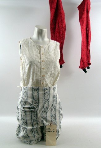 Mirror Mirror Evil Queen (Julia Roberts) Movie Costumes: EQW "O" Evil Queen (Julia Roberts) screen worn for sketch, off white button front with embroidery top, white and grey floral print with buttons on the front shorts, and red and light red long socks. I