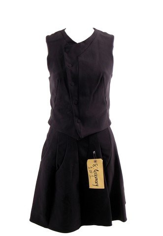 The Giver Rosemary (Taylor Swift) Movie Costumes: The Giver - Rosemary (Taylor Swift) screen worn, hero, black neoprene with magnetic closure on the front waistcoat, and black neoprene with zipper in the back skirt. Includes wardrobe tag!