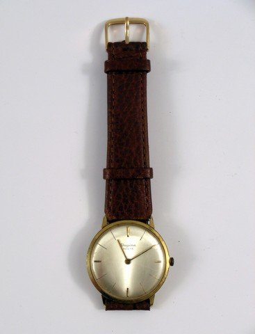 Big Eyes Dick Nolan (Danny Huston) Watch Movie Props: Dick Nolan (Danny Huston) screen used, hero, 'Dugena' wristwatch with extra wristband.