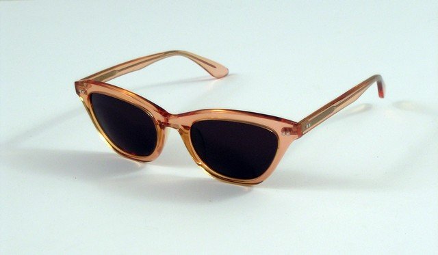 Big Eyes Margaret (Amy Adams) Sunglasses Movie Props: Margaret Keane (Amy Adams) screen worn, hero, clear light orange plastic frame sunglasses.