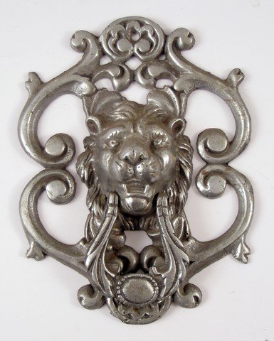 Harry Potter Metal Door Knocker Movie Props: From the ever popular trilogy Harry Potter Sorcerer's Stone comes this metal lion door knocker direct from the set. Measures approx. 10" long.
