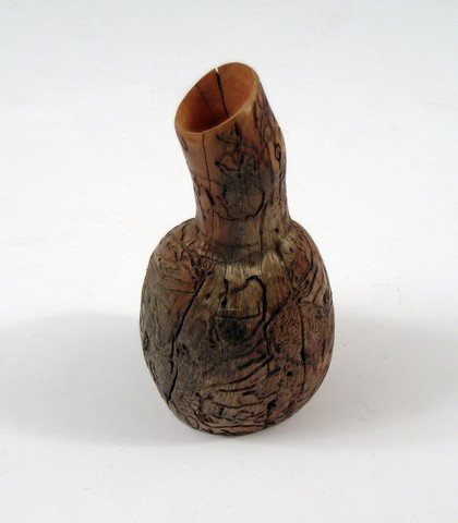 The Hobbit Drinking Movie Props: Oscar winner and from the mega blockbuster series The Hobbit directed by Peter Jackson comes this wood carved drinking container direct from the set! A must for all Hobbit fans. Measures approx. 5 1/2