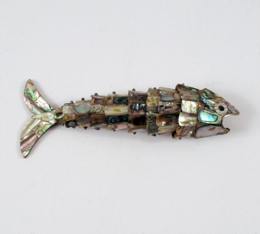 Weekend At Bernie's Fish Bottle Opener Movie Props: One of the most classic movies is Weekend at Bernie's. Direct from the production is a fish bottle opener. Measures approximately 7 1/2" long.