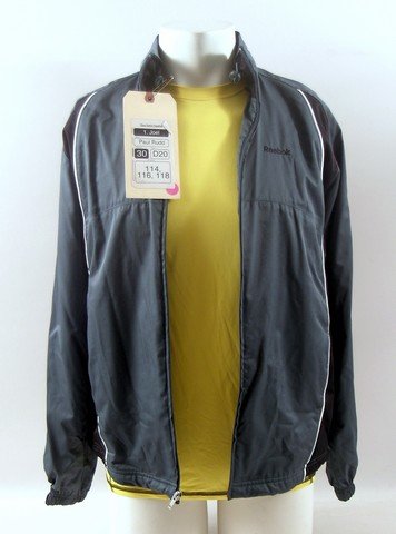 They Came Together Joel (Paul Rudd) Movie Costumes: Joel (Paul Rudd) screen worn, hero, slate with white piping and black detail long sleeve button front 'Reebok' jacket, (size S) and neon yellow with grey stitching 'Under Armor' athletic shirt. (size