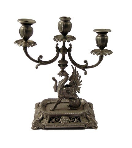 Harry Potter Sorcerer's Stone Candle Holder Movie Props: Harry Potter Sorcerer's Stone (2001) - Diagone Alley metal dragon tri-candle holder. (approx. 13 1/2" tall) Light up your collection with this uniquely designed item which features a three pronged can