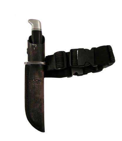 Falling Skies Maggie (Sarah Carter) Knife, Sheath, Leg: Maggie's (Sarah Carter's) real, fixed blade 'Buck' combat knife. The steel blade attaches to a black, semi-scalloped handle with silver endpieces. Includes a thick, brown leather sheath engraved with 