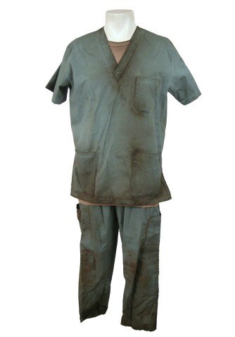 Falling Skies Street Fighter Victor Sgt. Trevor Huston: Season 5, Episode 7 - Sgt. Trevor Huston's (Lane Edwards) screen worn, distressed, green v-neck short sleeve three pocket "Mobb" scrub set, and beige short sleeve crew neck "Rothco" t-shirt. Includes 