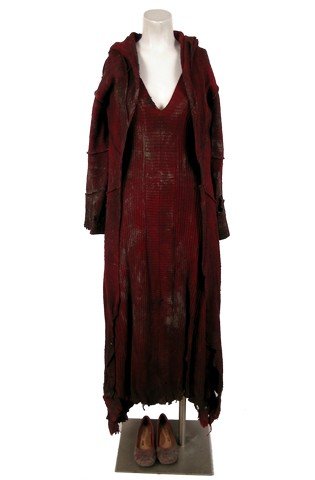 Falling Skies Season 4 Alexis "Lexi" Glass-Mason: Alexis "Lexi" Glass-Mason's (Scarlett Byrne) screen worn outfit in Season 4. When Lexi matures (post-cocoon), she adopts a crimson-colored High Priestess look befitting her burgeoning powers and omino