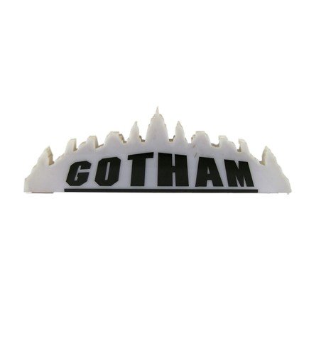 Batman Series Gotham City Cab Sign Movie Props: Featured in the mega popular franchise Batman film series is this black and white Gotham City Cab sign. Very unique as it showcases the outline of the city with Gotham in dark black lettering. (approx