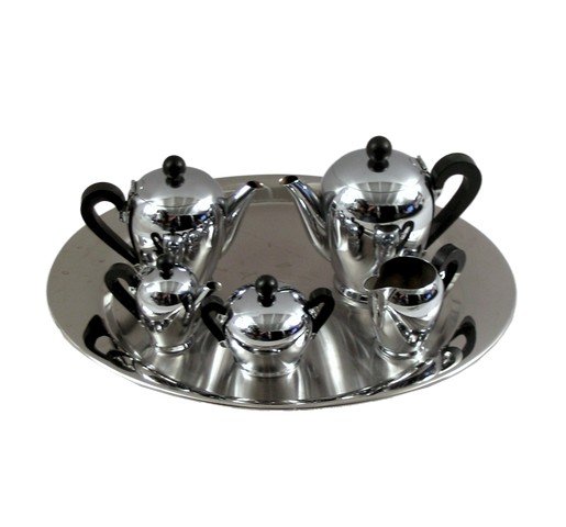 Mad Men Screen Used Sterling Cooper Ad Agency Tea Set: Mad Men TV Series (2007–2015) - Sterling Cooper Advertising Agency screen used, silver toned coffee and tea set made by Alessi of Italy. (approx. 18" x 15 1/2") Includes COA.