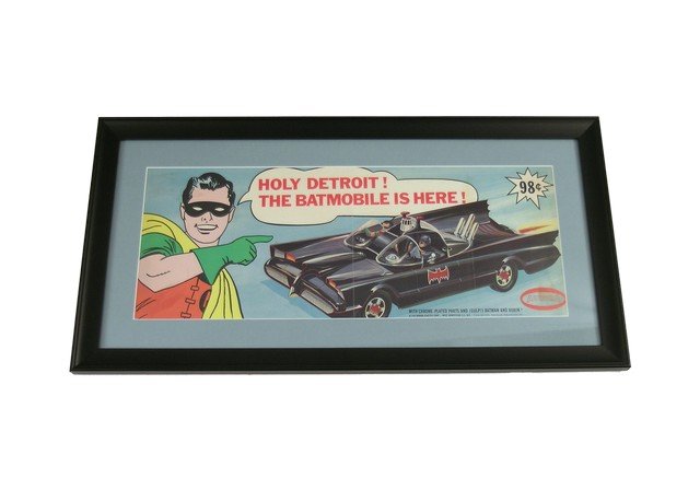 1966 Aurora Batmobile Holy Detroit! Movie Props: 1966 Aurora Batmobile glass framed color advertisement with Holy Detroit! The Batmobile is Here! 98¢. This is a great collectible to own based on the hit TV series and measures approximately 27" x 14