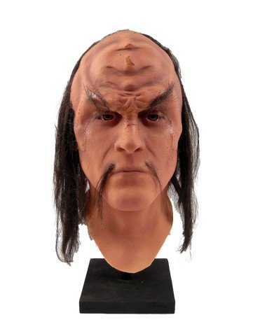 Star Trek Beyond Klingon Prosthetic Movie Props: Direct from the set of Star Trek: Beyond (2016) is a Star Trek Klingon Prosthetic make up study maquette. This comes complete with a forehead latex prosthetic with ridges and is complemented with blac