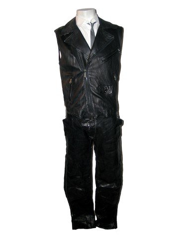 Brüno (Sacha Baron Cohen) Leather Movie Costumes: Acquired from the set of the production Brüno (2009) is Brüno's (Sacha Baron Cohen) hero screen used black leather with zipper pockets on the front zipper up the front vest, white sleeveless button 