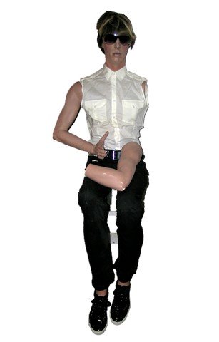 Brüno (Sacha Baron Cohen) Mannequin Movie Props: Direct from the production of the smash comedy Brüno (2009 )is Brüno's (Sacha Baron Cohen) screen used full size sitting down mannequin with white cut-off dress shirt, sunglasses, wig, black pants,