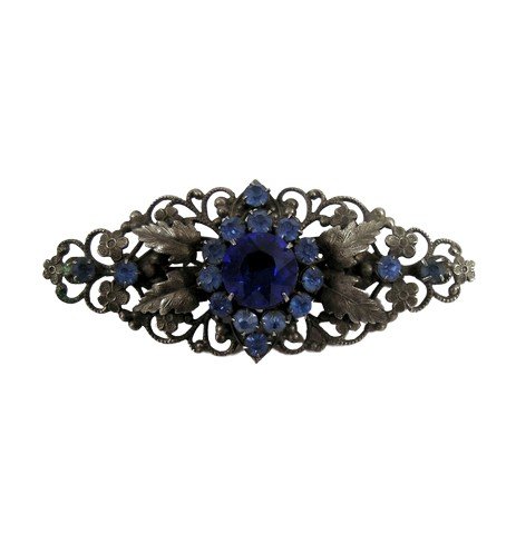 Titanic Flower Designed Blue Flower Broach Movie Props: Acquired from the production department of one of the biggest grossing movies of all time Titanic (1997) is a thin metal with blue flower designed broach. This production used movie prop measures appr