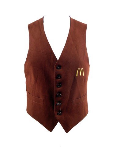 Coming To America Semmi (Arsino Hall) McDonald's Vest: From the hilarious classic feature film Coming To America is Semmi's (Arsenio Hall) production used McDonalds brown button vest with McDonald's logo on the front. This was a prototype jacket and used 