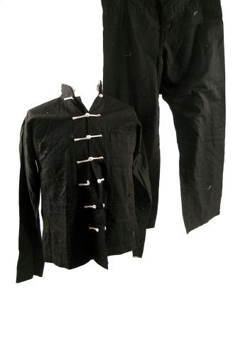 The Last Dragon Tai (Ernie Reyes Jr.) Movie Costumes: From the dramatic cult film, The Last Dragon (1985) is Tai (Ernie Reyes Jr.) black with white knot closure long sleeve 'Da Di' shirt, (size S) and black with tie at the waist pants.