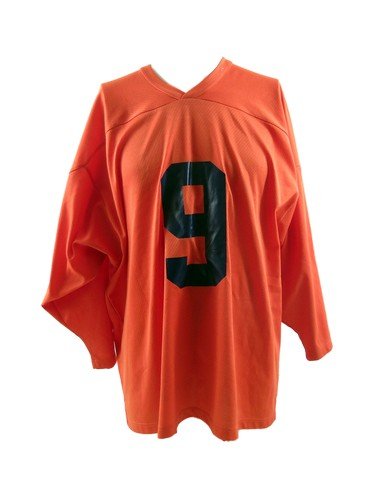 The Waterboy Football Jersey: Direct from the production of the Adam Sandler comedy The Waterboy (1998) is a production used "9" Orange football team 'CCM' jersey. There is a "9" on both sides of the jersey and it is a size XL.