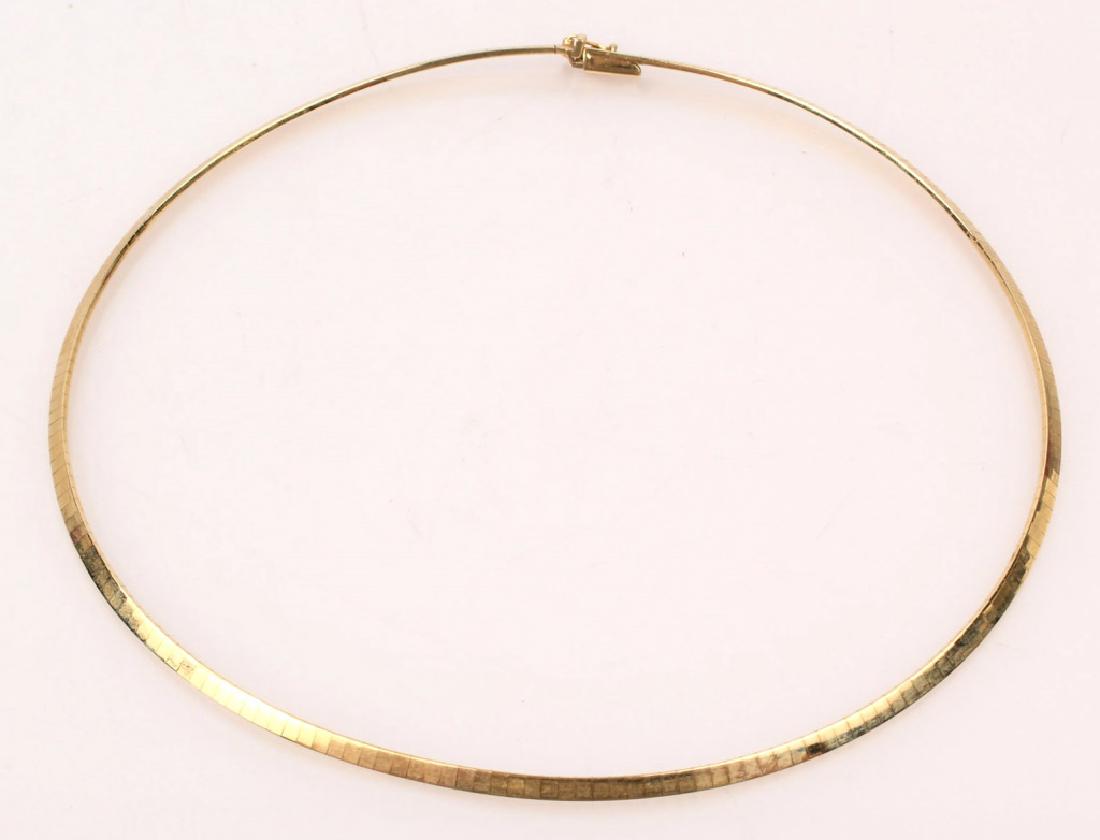 LADIES 14K YELLOW GOLD OMEGA NECKLACE: LADIES 14K YELLOW GOLD OMEGA NECKLACE Curved 3mm omega necklace 16.5" overall with integrated box clasp and safety latch. Weight: 18.2 Grams Size: 5.25" round