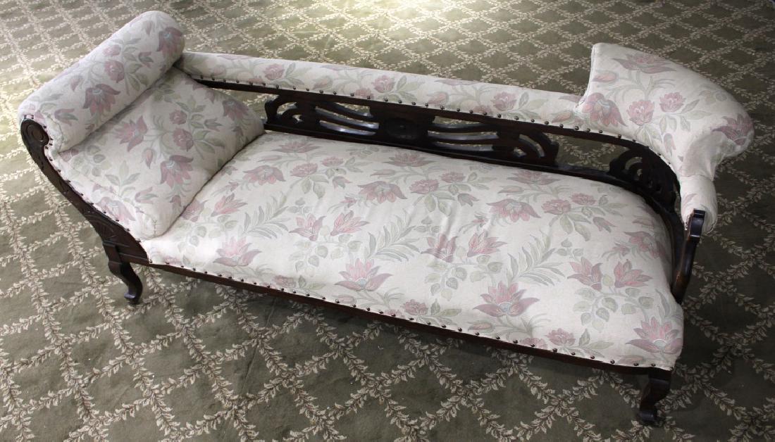 VICTORIAN FAINTING COUCH: VICTORIAN FAINTING COUCH Victorian fainting couch with floral upholstery, with casters. Size: 25 x 70 x 29"