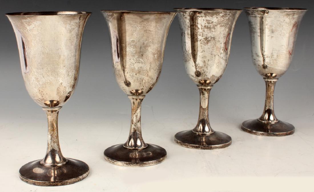 4 WALLACE STERLING SILVER GOBLETS: 4 WALLACE STERLING SILVER GOBLETS Set of four Wallace Silversmiths sterling silver water goblets, pattern 14. Weight: 186.1 grams each Size: 7"