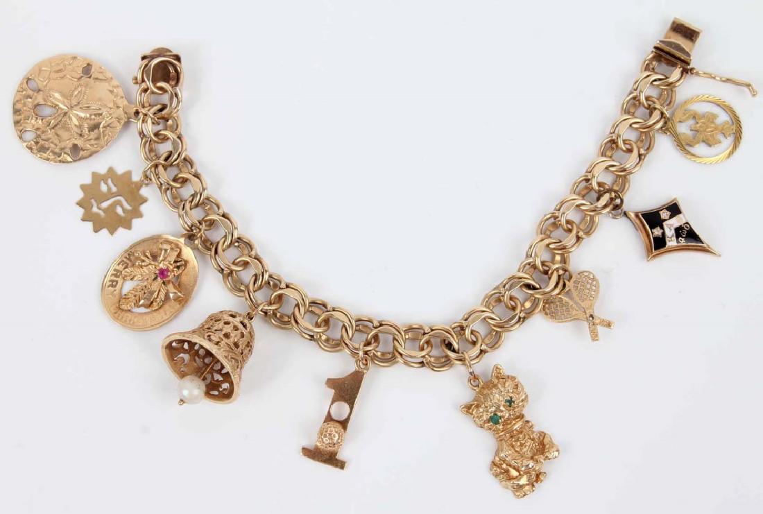14K YELLOW GOLD CHARM BRACELET WITH NINE CHARMS (1 of 4)