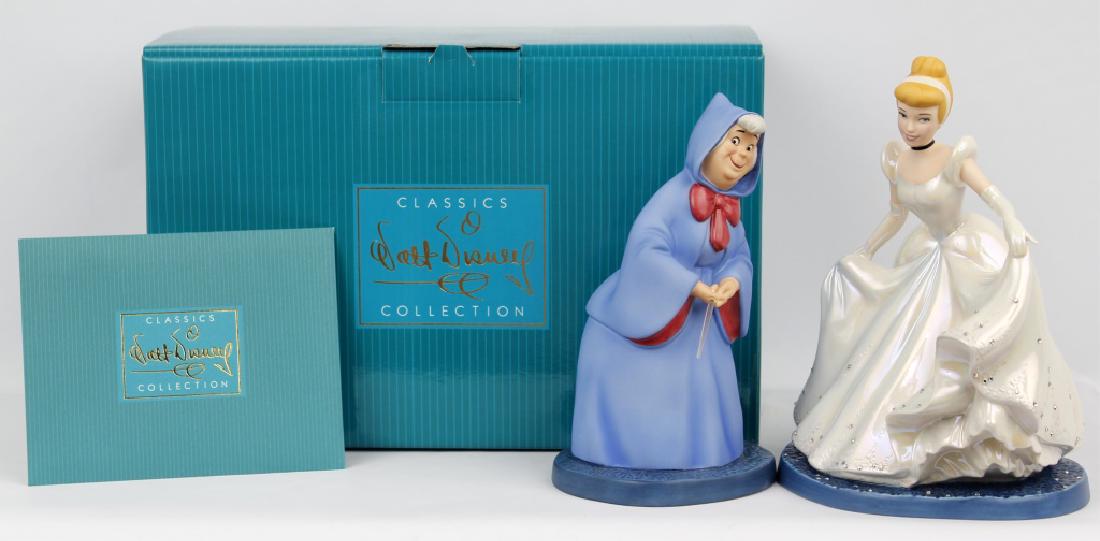 CLASSIC WALT DISNEY COLLECTION - CINDERELLA: CLASSIC WALT DISNEY COLLECTION - CINDERELLA Walt Disney's classic collection of figurines. "A Magical Transformation." Marked with Harp, issue 299. Disney number 1231051. Made in 2004. Cinderella and 