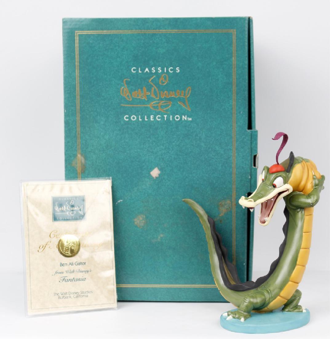 CLASSIC WALT DISNEY COLLECTION - FANTASIA: CLASSIC WALT DISNEY COLLECTION - FANTASIA Walt Disney's Classic Collection figurine. From Fantasia titled "Ben Ali Gator" Ben Ali gator Issue 185 Marked with Sailor's Hat made in 1996. Size: 8" Condit