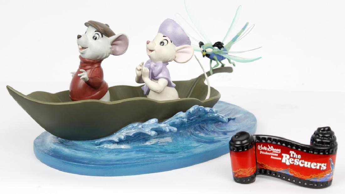 CLASSIC WALT DISNEY COLLECTION - RESCUERS: CLASSIC WALT DISNEY COLLECTION - RESCUERS Walt Disney's Classic Collection figurines. From The Rescuers, titled "Brave Bianca" ,"Bold Bernard" , The Evinrude base and opening title canister. All Marke
