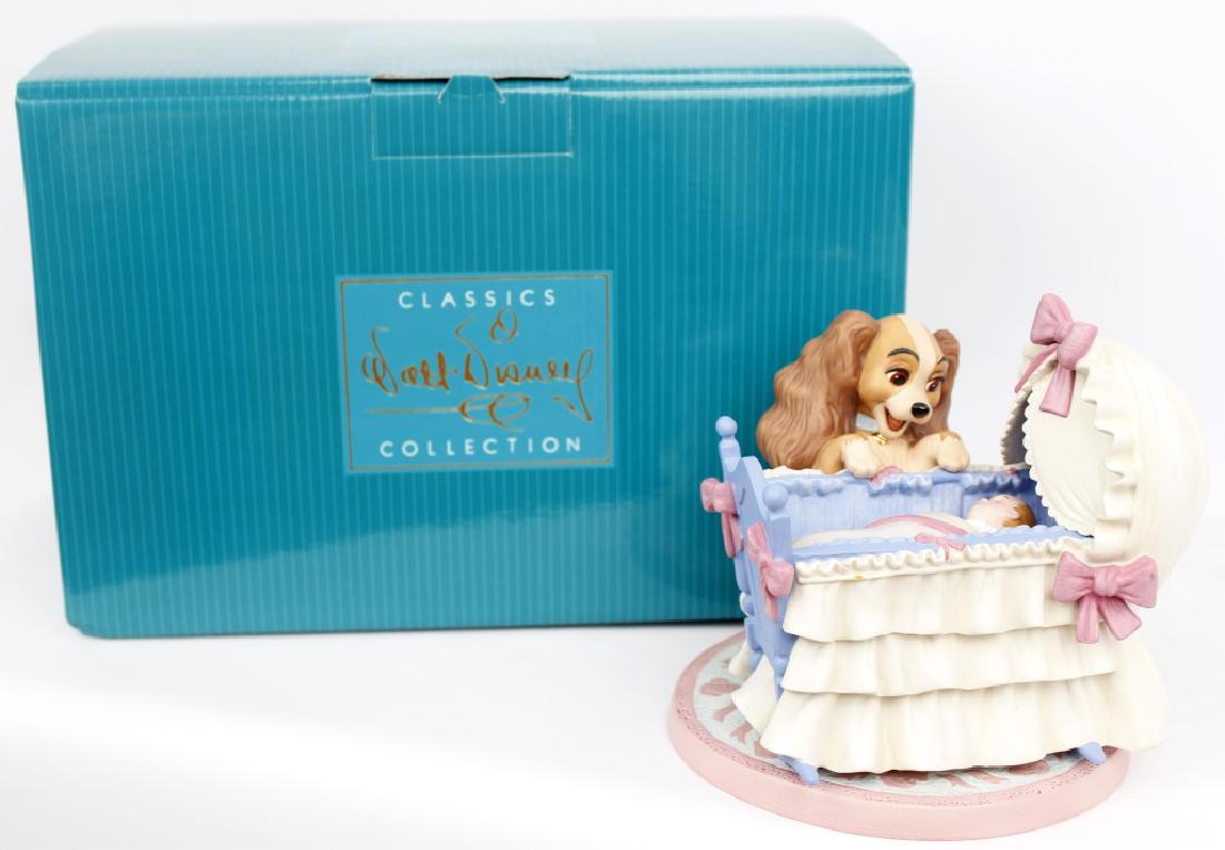 CLASSIC WALT DISNEY COLLECTION - LADY & THE TRAMP: CLASSIC WALT DISNEY COLLECTION - LADY & THE TRAMP Walt Disney's Classic Collection figurines. From Lady and the Tramp, titled "Welcoming Little Darling." Lady and the Cradle. Marked with the Harp, iss
