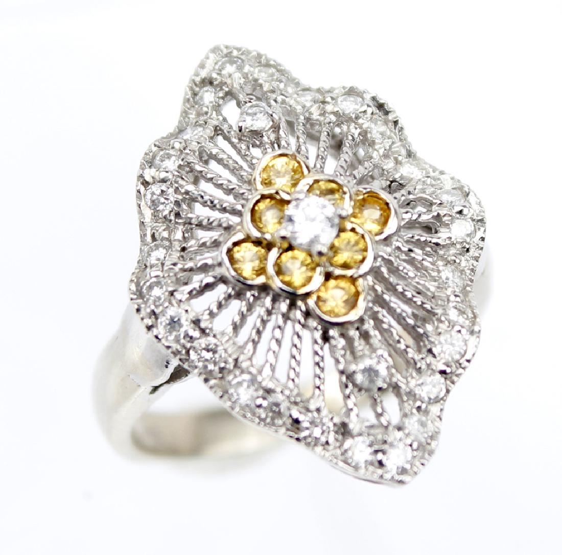 14K WHITE GOLD YELLOW DIAMOND RING: 14K WHITE GOLD YELLOW DIAMOND RING 14k white gold ring with yellow and white diamond accent stones. Weight: 3.8 g Size: 5