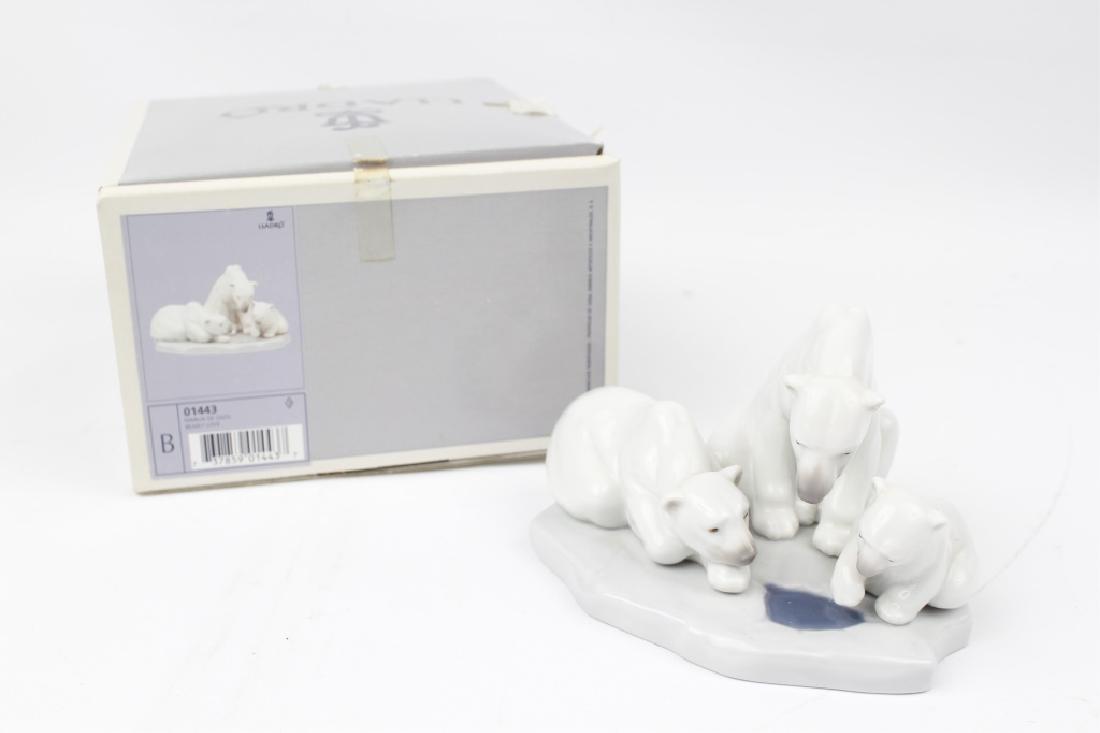 LLADRO PORCELAIN FIGURINE BEARLY LOVE: LLADRO PORCELAIN FIGURINE BEARLY LOVE Lladro porcelain figurine "Bearly Love" number 1443. A family of polar bears around a water hole. Hand crafted in Spain and in original box. Size: 5"