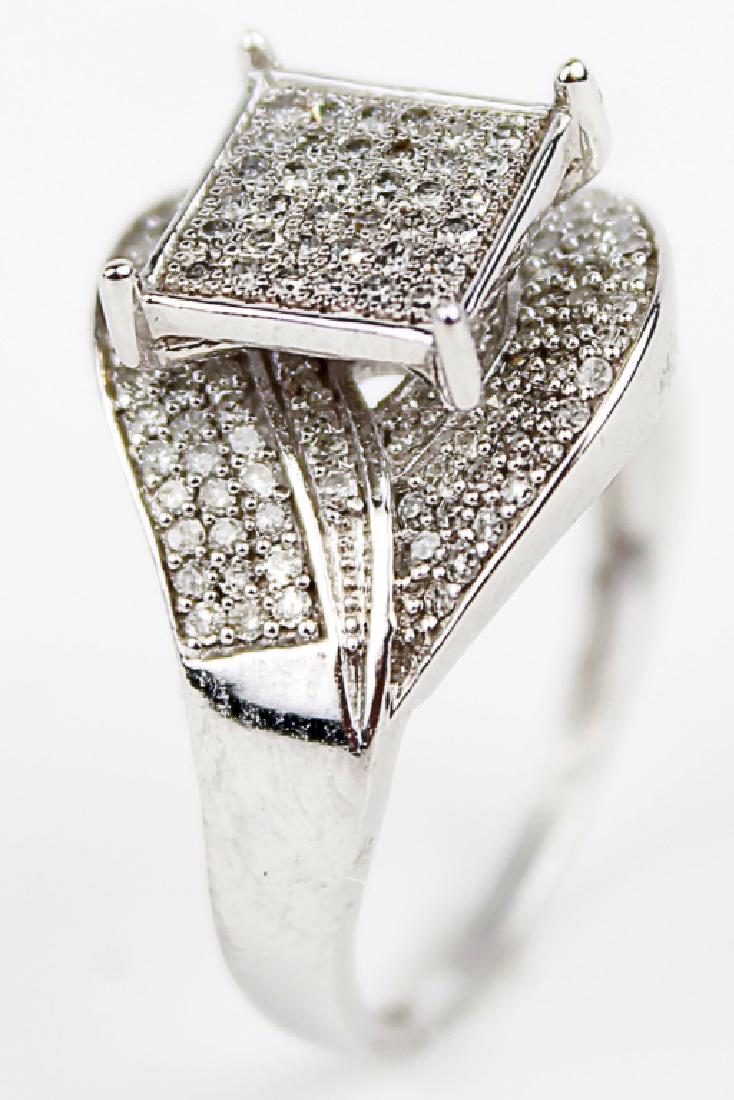 14K WHITE GOLD DIAMOND LADIES FASHION RING: 14K WHITE GOLD DIAMOND LADIES FASHION RING 14k white gold ladies fashion ring with micro pave cluster diamonds. (150) .005 ct micro pave diamonds, .75CTTW. Weight: 3.2 g Size: 7